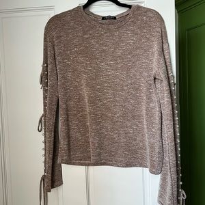 Pearl sleeve sweater